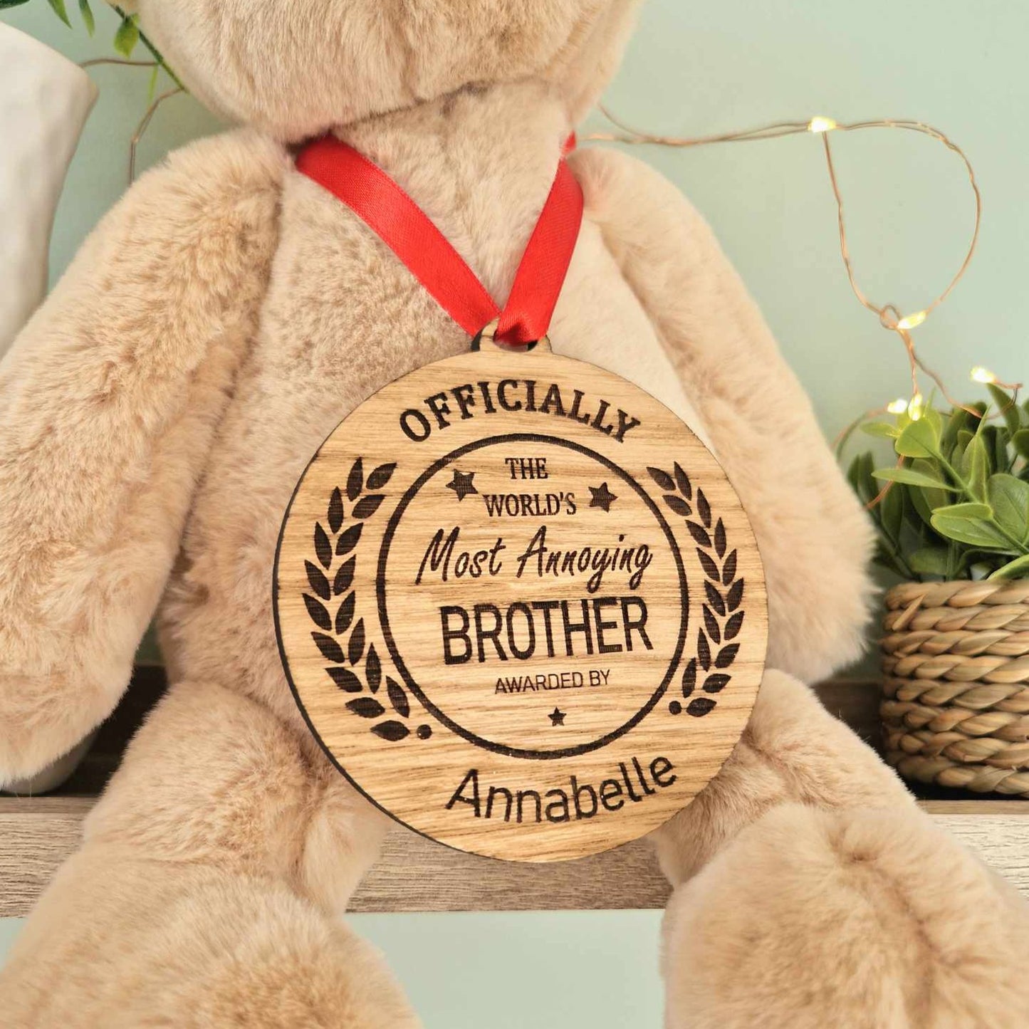 'World's Most Annoying Brother' Wooden Medal