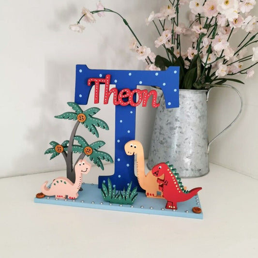 Bright and colourful Personalised Wooden Letter for Boys Nursery ir Bedroom in a Dinosaur/ Jurassic theme.