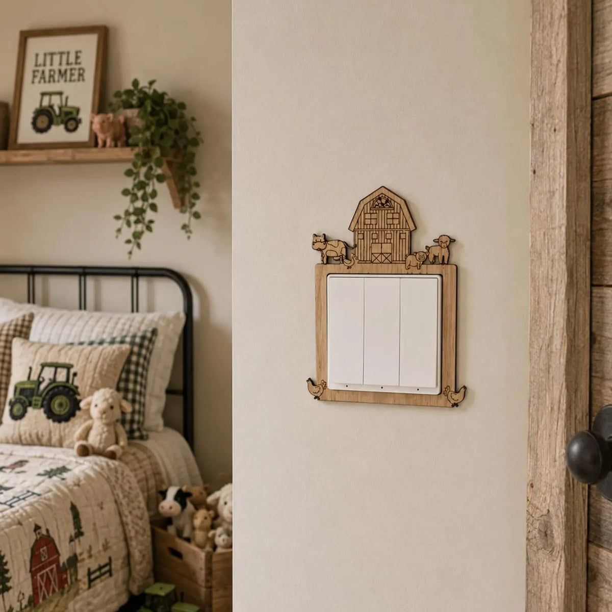A rustic wooden wall-mounted switch plate with a small barn and tractor design, shown installed on a beige wall in a styled children's bedroom.