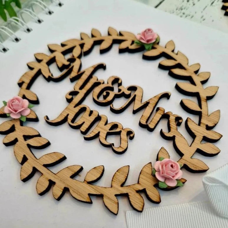 Personalised Wedding Guest Book and Cake topper in rustic oak venner wood decorated with mulberry paper roses.